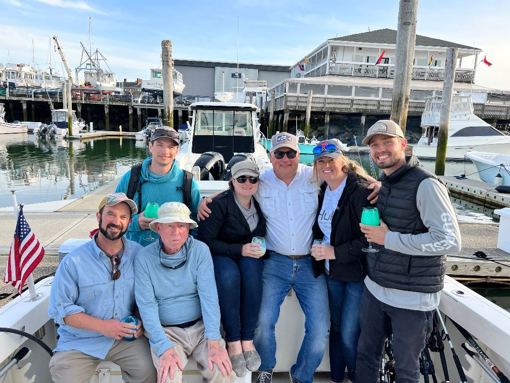 7 people fishing in unknown location