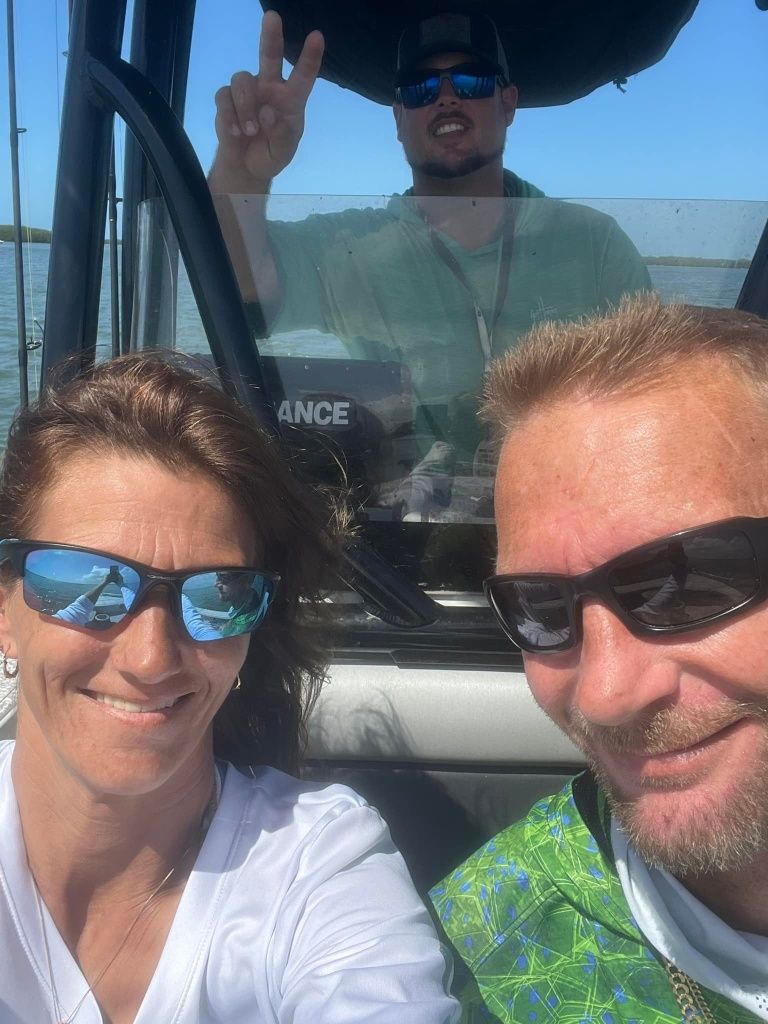 Three anglers fishing in unknown location