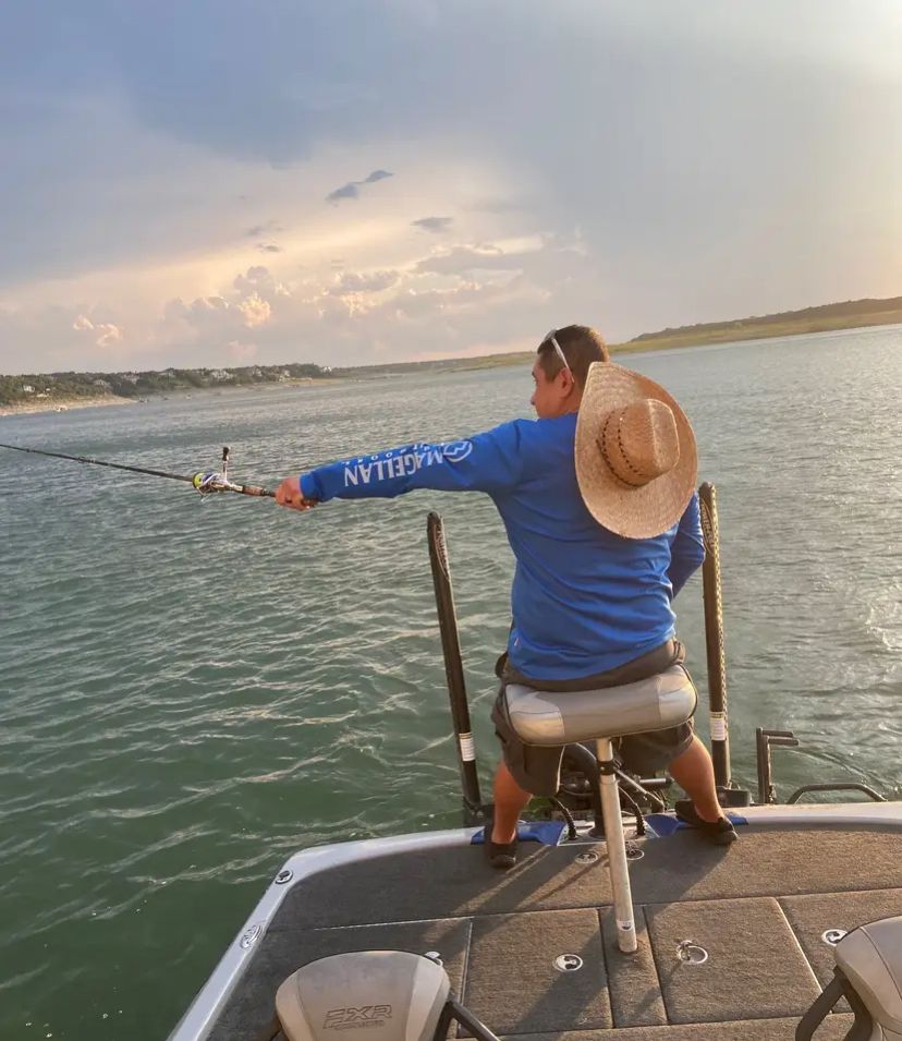 Angler fishing at unknown location