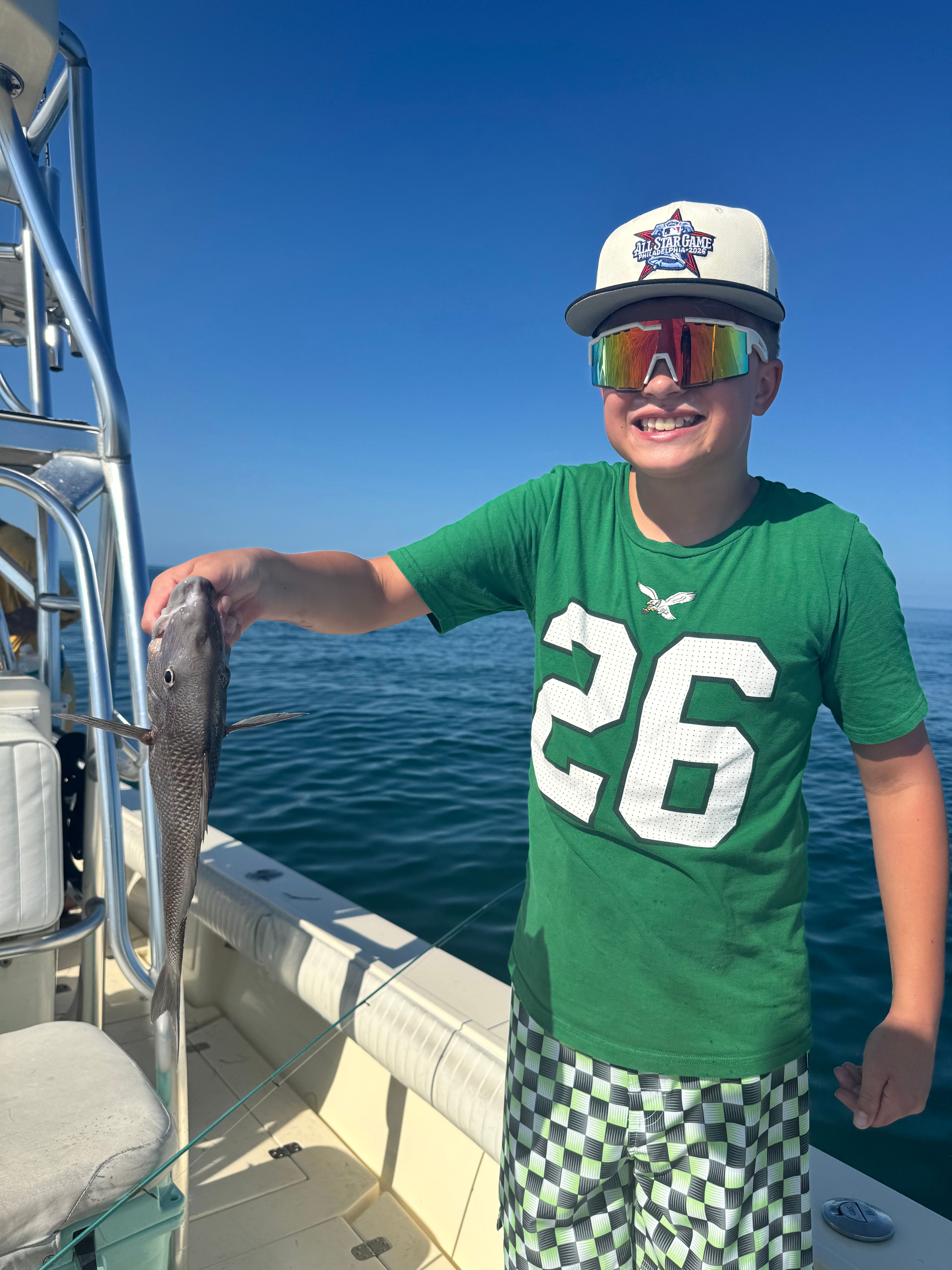 Fresh caught fish displayed on fishing boat deck during offshore fishing trip