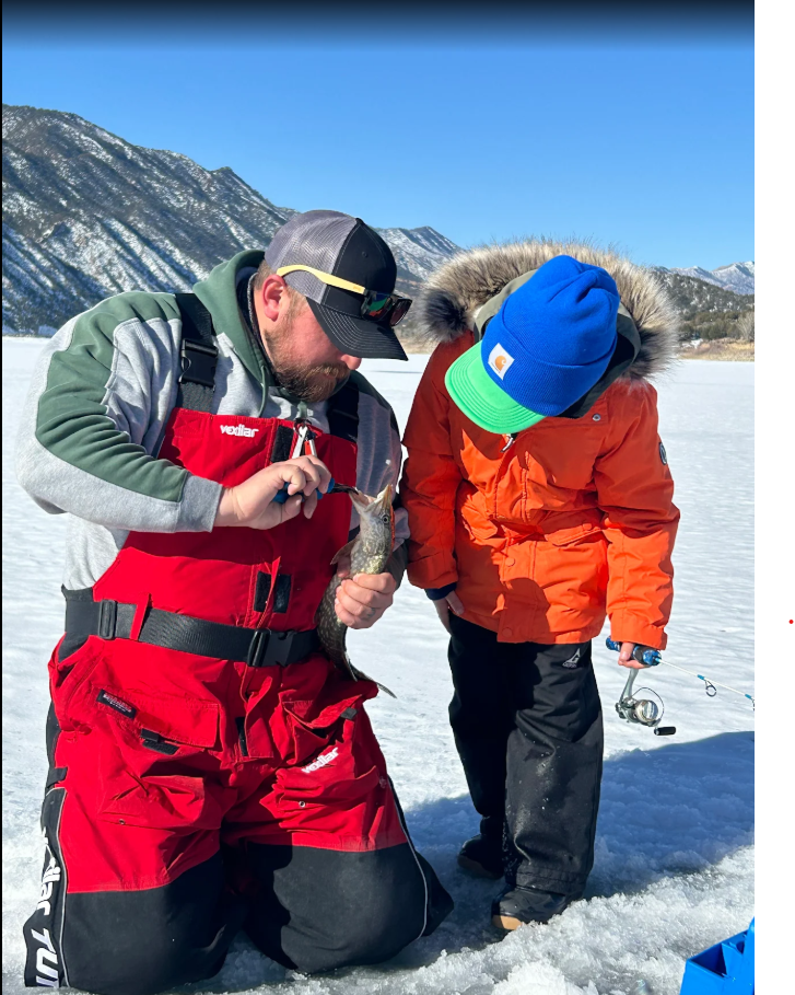 Angler with fishing rod enjoying outdoor adventure
