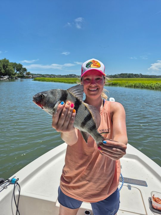 Reeling in the best fishing day with a 15-inch Black Drum!