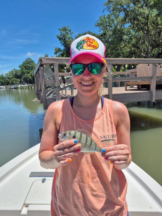 Light tackle triumph: Pinfish dancing on the line in stormy Hilton Head!