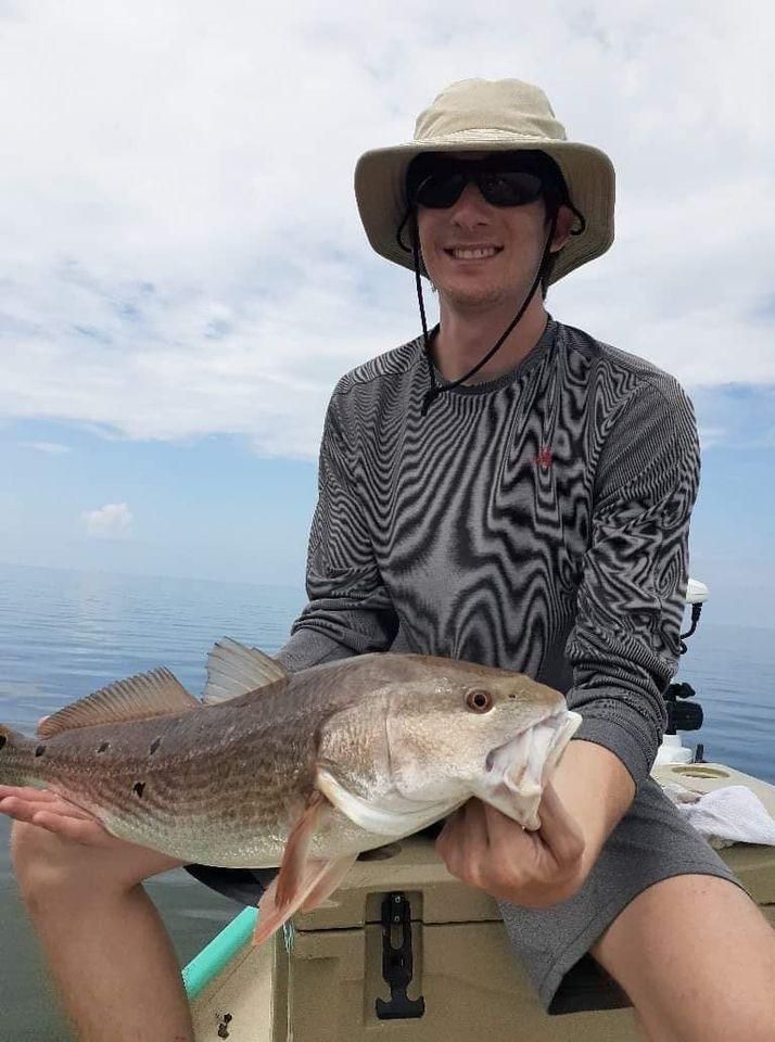 A single person fishing in an unknown location