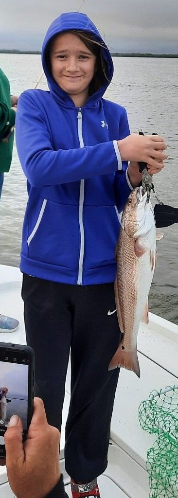 A redfish caught by a fisherman