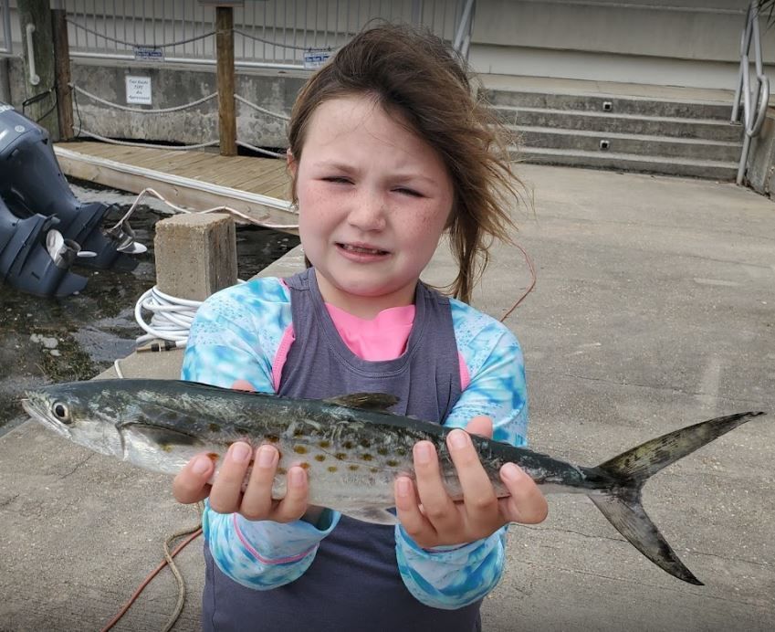 Angler catches a 13-inch fish while fishing