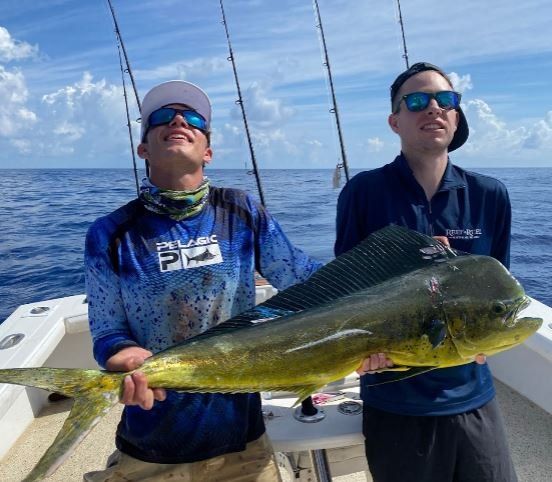 Fisherman with large catch in unknown location