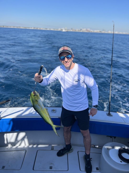 Reeling in the catch of the day on the open ocean.