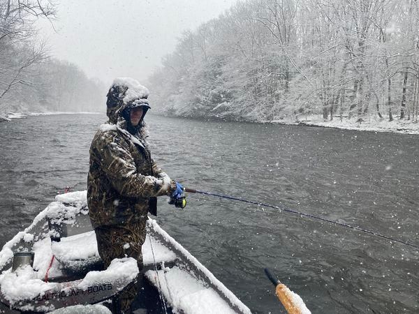 Angler fishing in unknown location