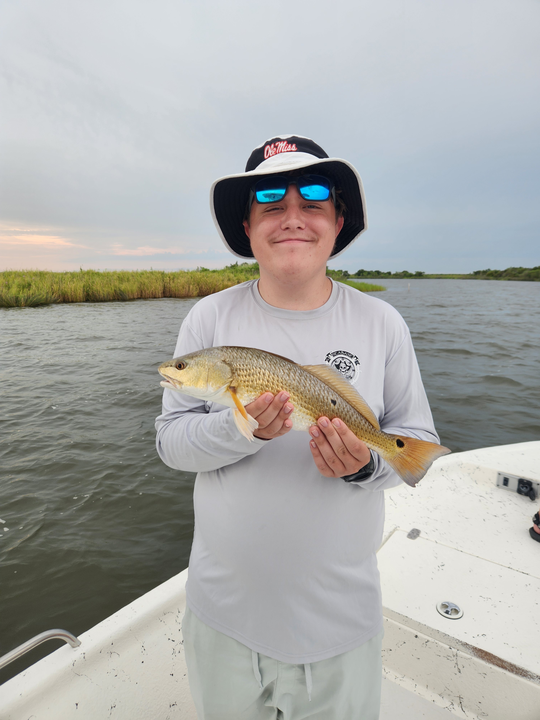 Reeling in the redfish gold in the Big Easy!