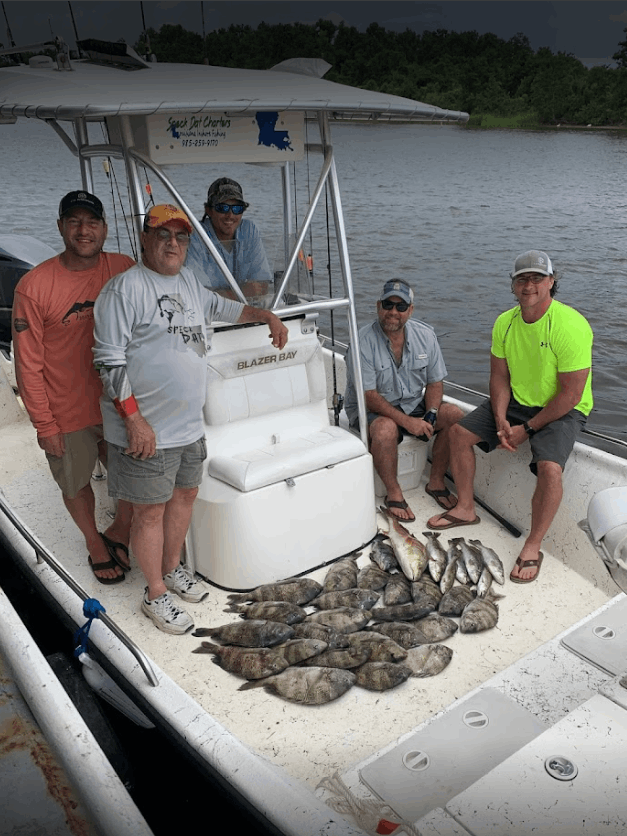 Five people fishing at an unknown location