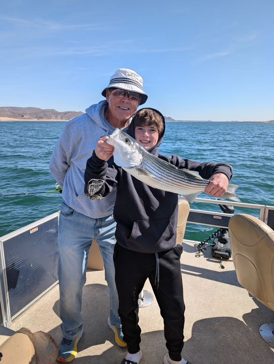 Reeling in the big one on the lake!