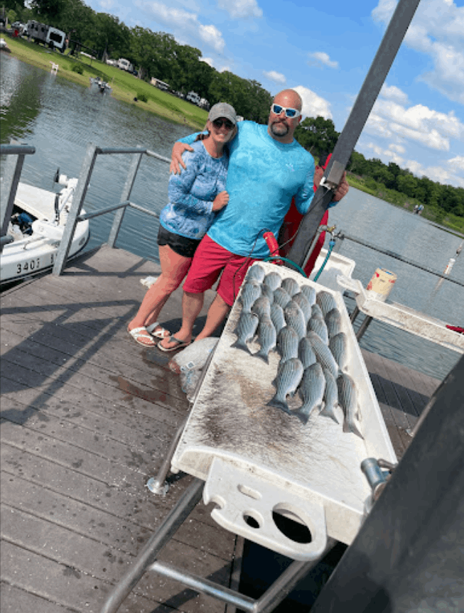 Anglers fishing at scenic location