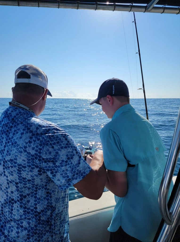 Person fishing in unknown location