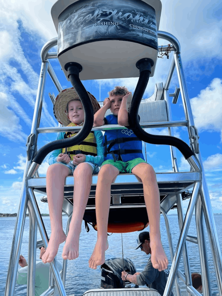 Two people fishing in an unknown location