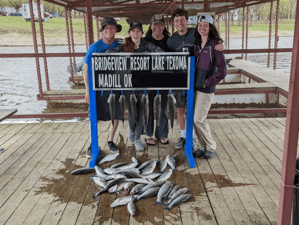 Group of 5 people enjoying a fishing trip