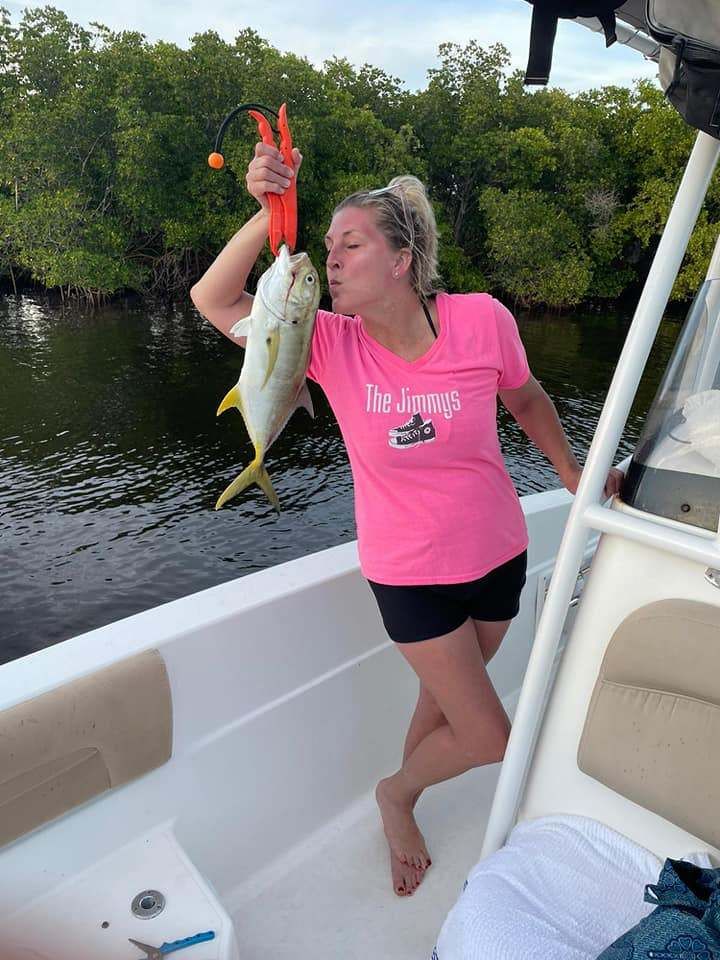 Angler with fishing rod in unknown location