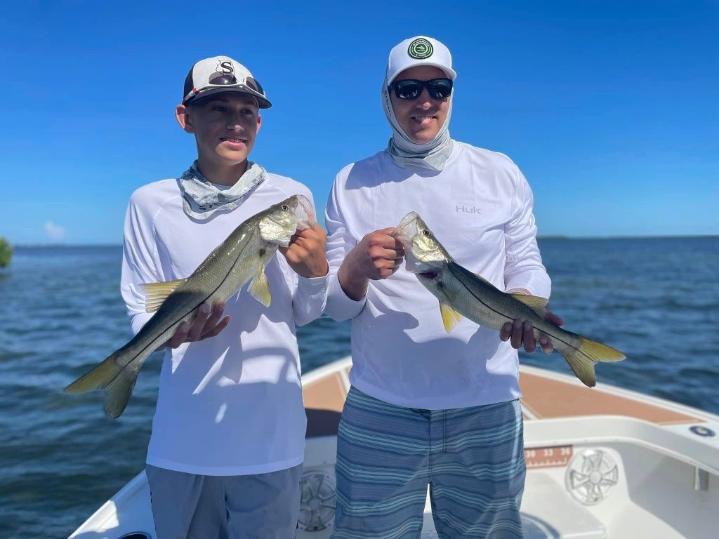 Two people fishing in an undisclosed location