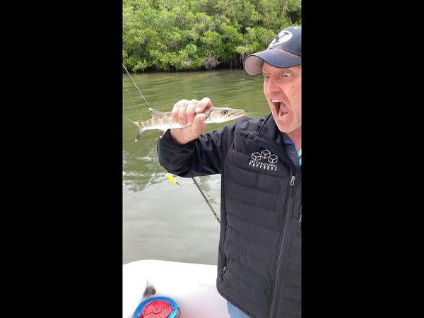 Person fishing at an unknown location