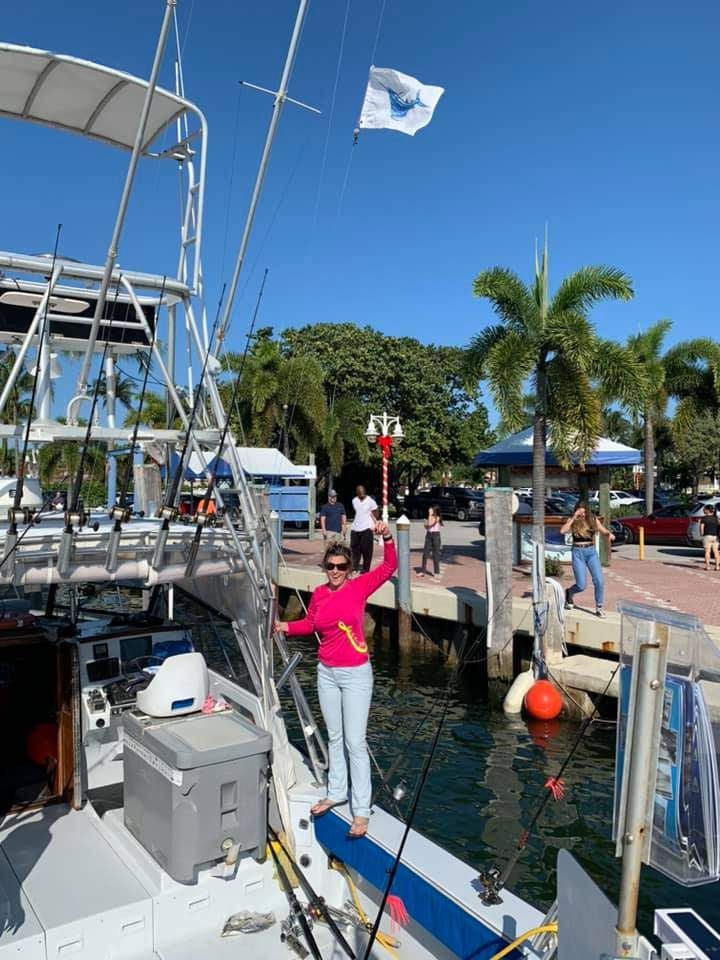 3 people fishing at unknown location