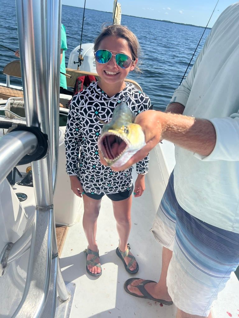 Fisherman with a single catch in an unknown location