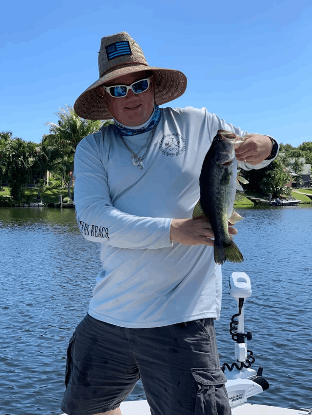 Solo fisherman catching a 12-inch fish