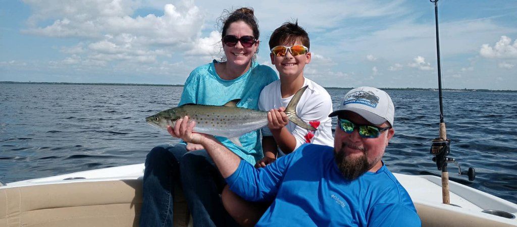 Catching a Spanish Mackerel fish while fishing