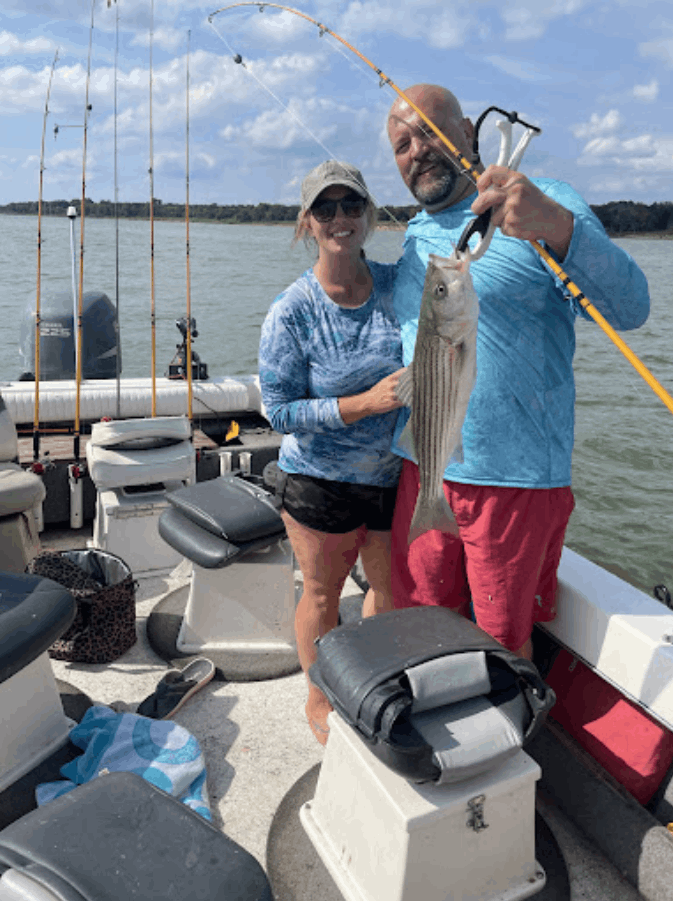 Fishing for a striped bass, 22 inches long, in an unknown location