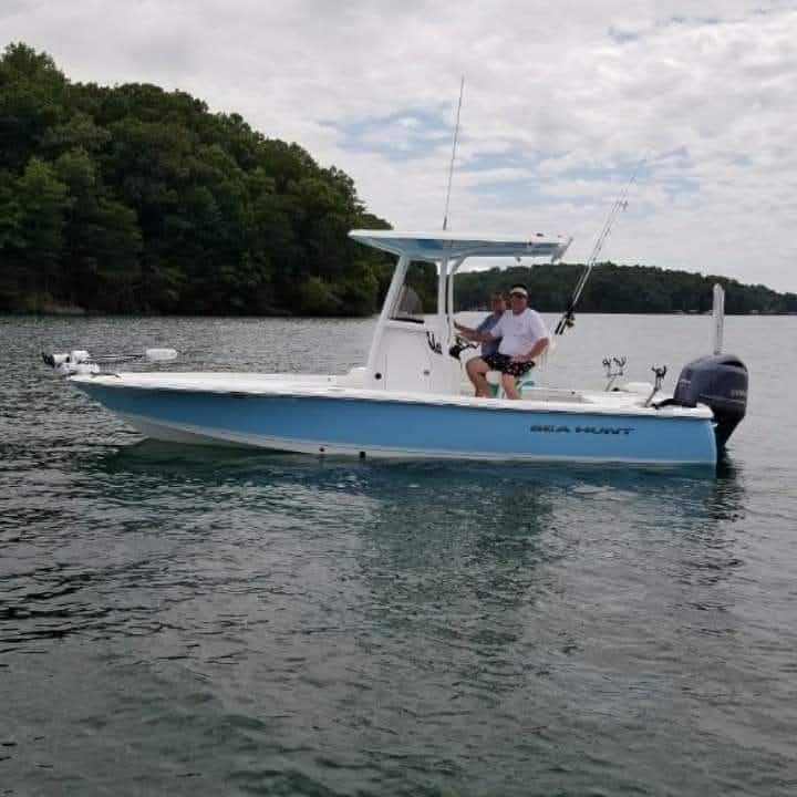 Peaceful day on the lake, 2 bass reeled in.