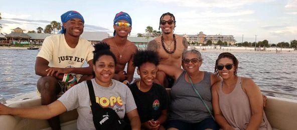 Seven anglers fishing at a scenic location