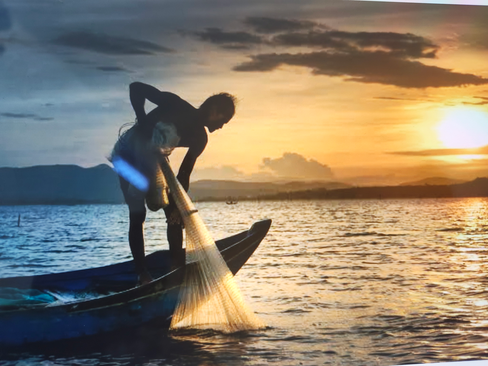 Hauling in the nets at sunset in Florida NY.