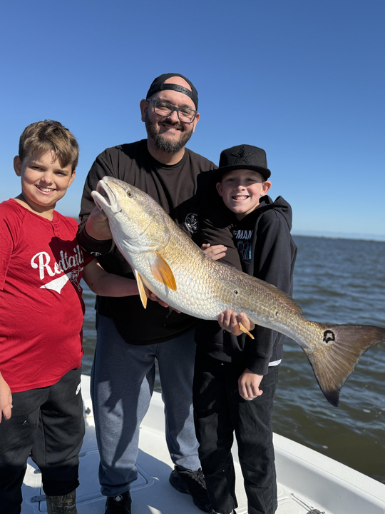 Nice redfish on deep sea light tackle as the weather cleared up!