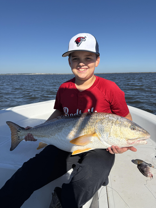 Nice catch using deep sea light tackle! Afternoon clearing made for perfect fishing conditions.