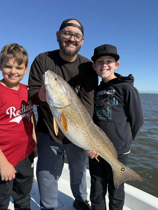 Nice redfish on deep sea light tackle! Weather cleared up perfectly for this adventure.