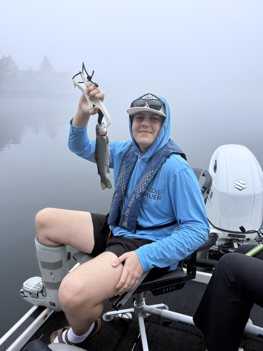 Hooked a feisty rainbow trout at 400, Boxcar Willie Drive!