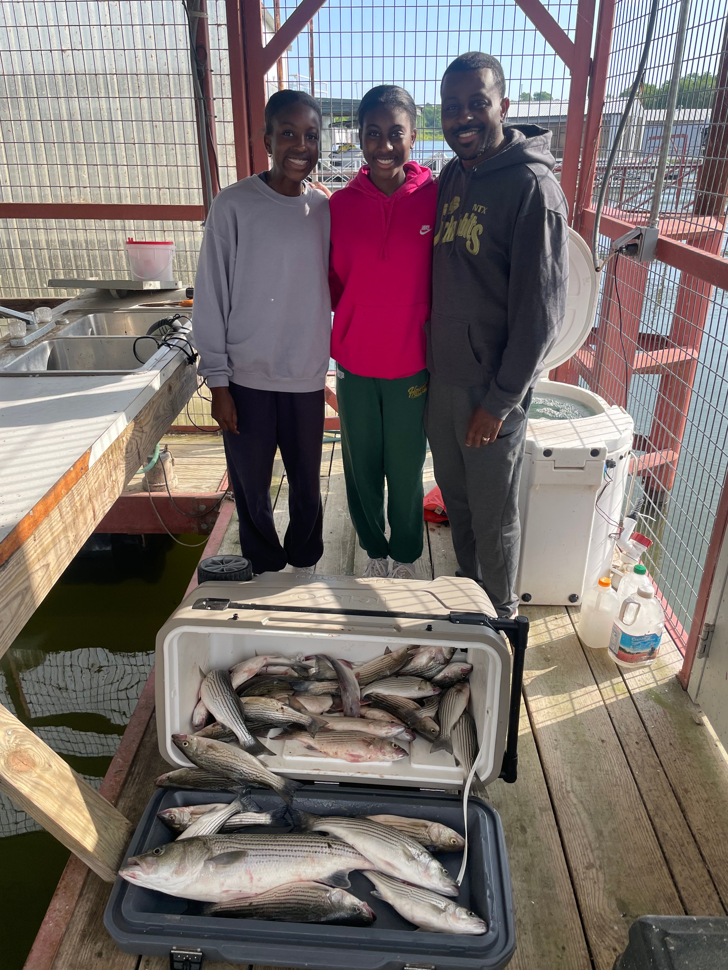 3 anglers fishing in a scenic location