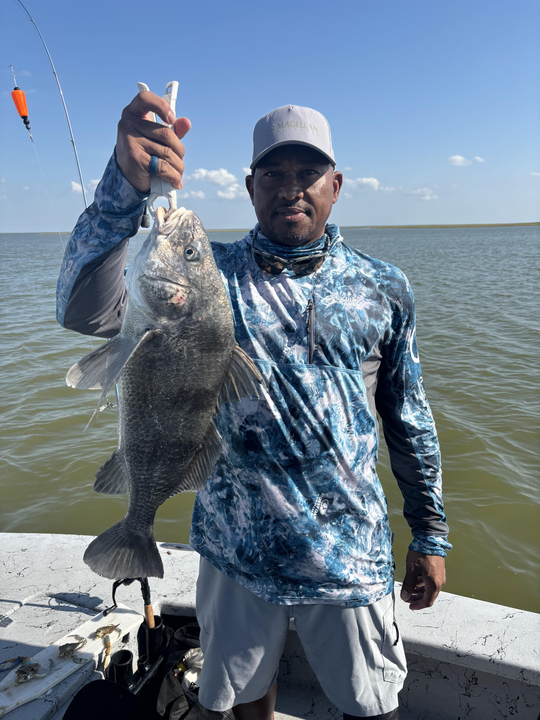 Nice black drum on light tackle! Perfect clear weather conditions made for an exciting adventure.