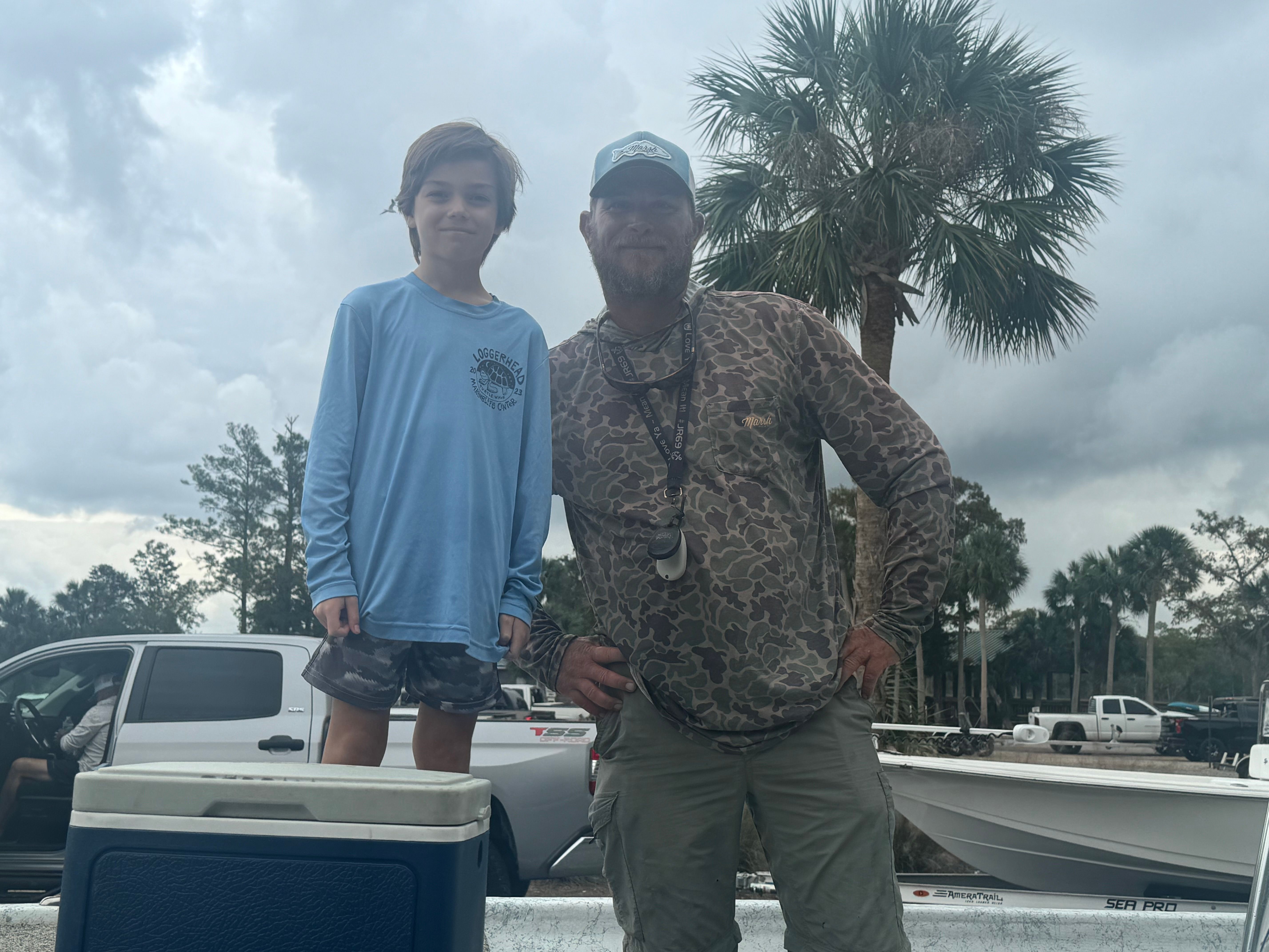 A person enjoys a day of fishing at an unspecified location.