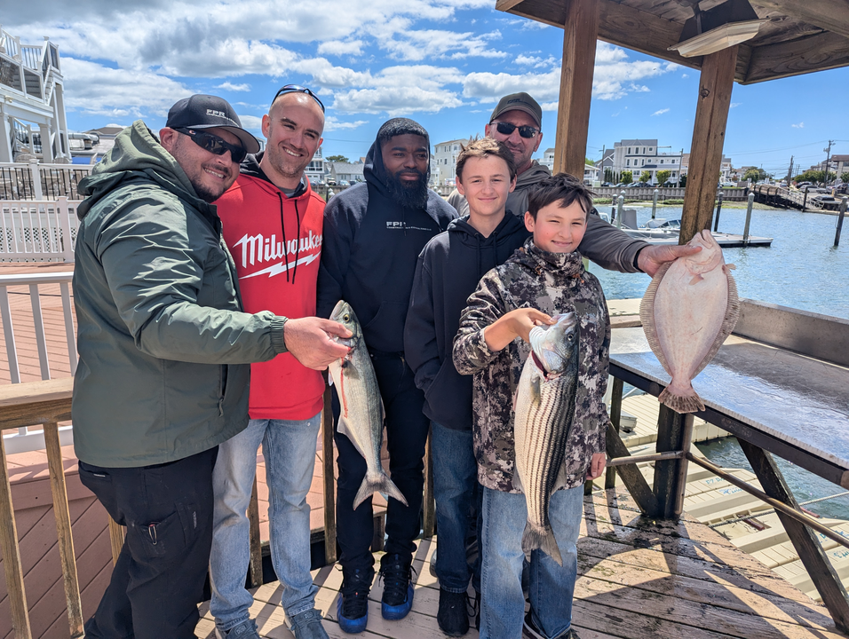 Reeled in a trio of tasty striped bass, flounder, and bluefish off the Atlantic City coast!