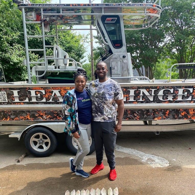 Two anglers fishing at a scenic location
