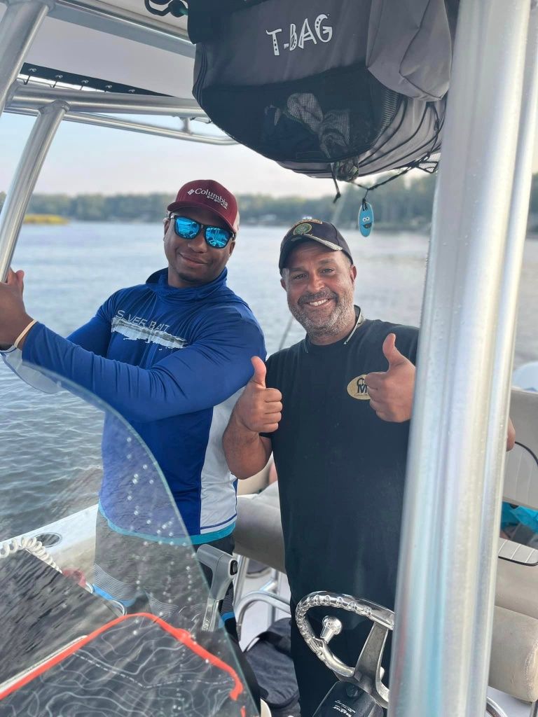 Two people fishing in an undisclosed location