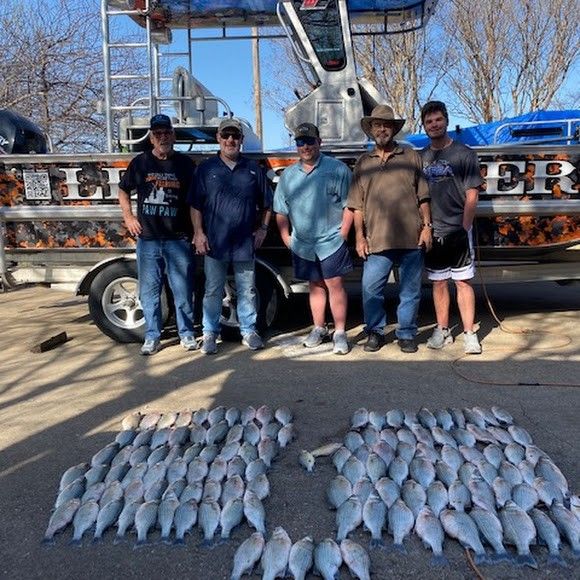 Six people fishing in unknown location