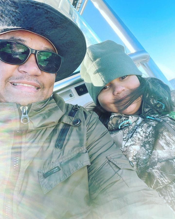 Two anglers fishing at an unspecified location