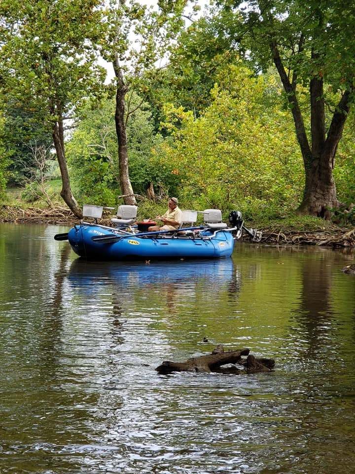 Person fishing in a scenic location