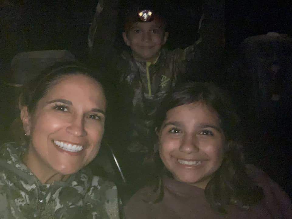 Three people fishing at an unknown location