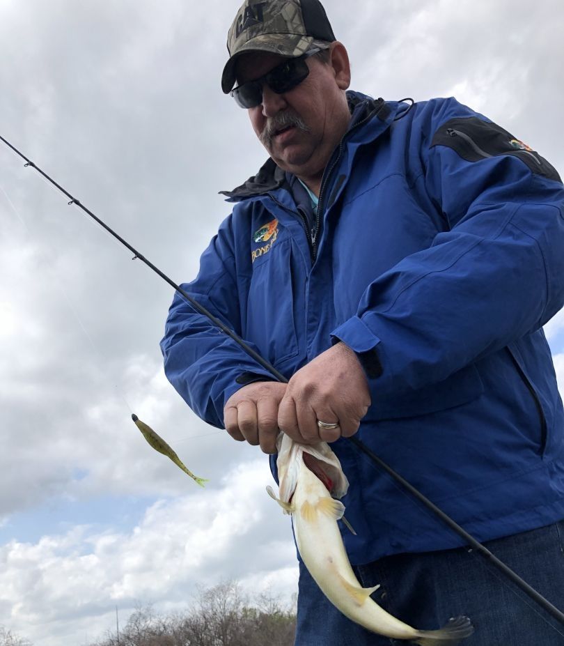 Lone angler fishing in mysterious location