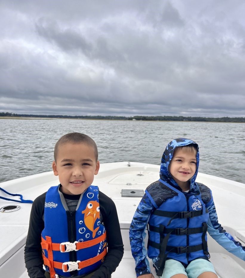 Two anglers fishing at an unknown location