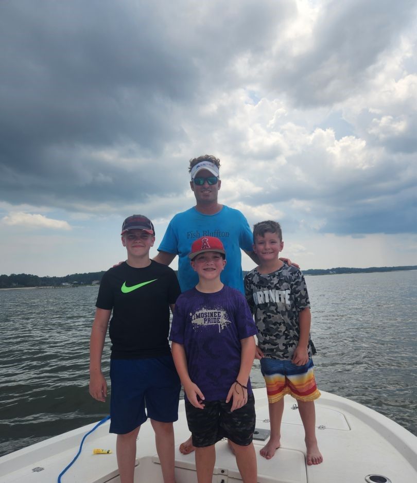 Four anglers fishing at an unknown location