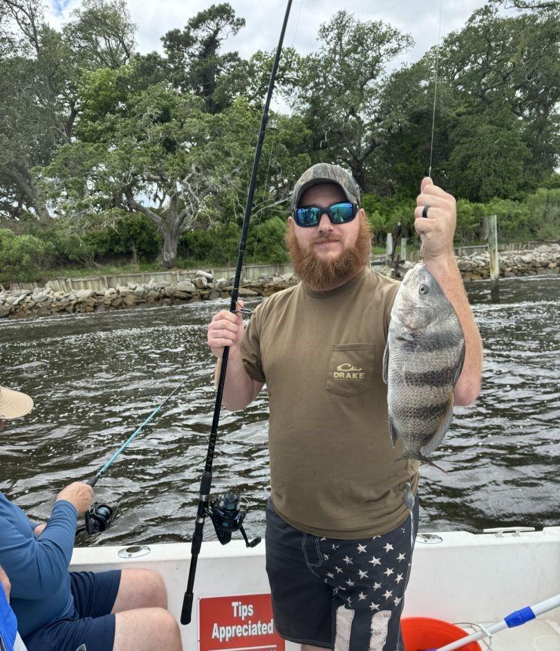 Black drum fish caught while fishing from boat on water