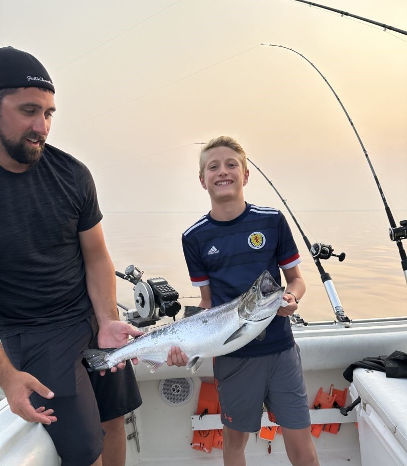 Chinook salmon caught during fishing trip on boat